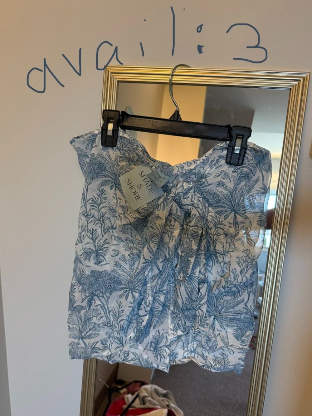 Shade & Shore short blue sarong. Slightly sheer with a tropical pattern. Size L
